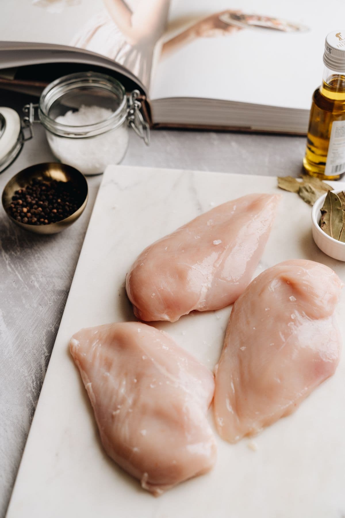 Fresh chicken cuts prepared on a board